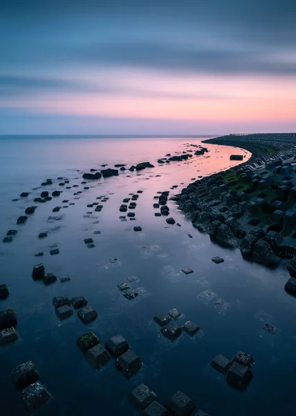 stock image An aerial view of a scenic sea coast during sunset