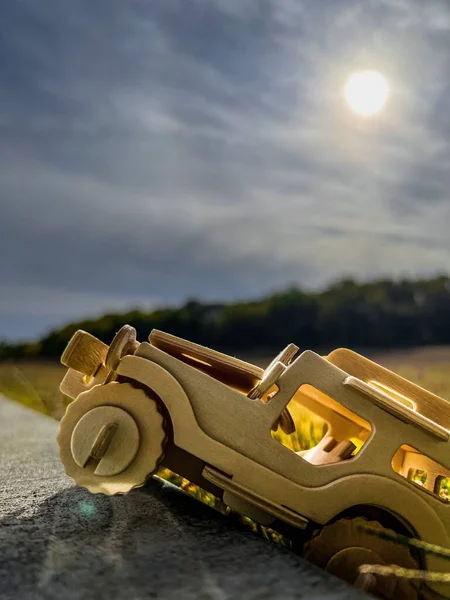Vertical Shot Wooden Road Toy Truck Rock Surface Bright Sun — Stock Photo, Image