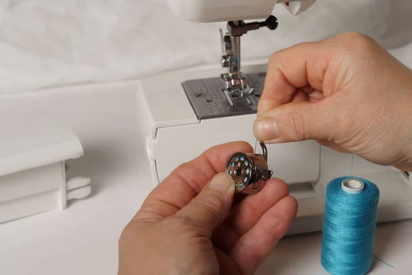 Close Woman Hands Putting Blue Thread Sewing Machine — 스톡 사진