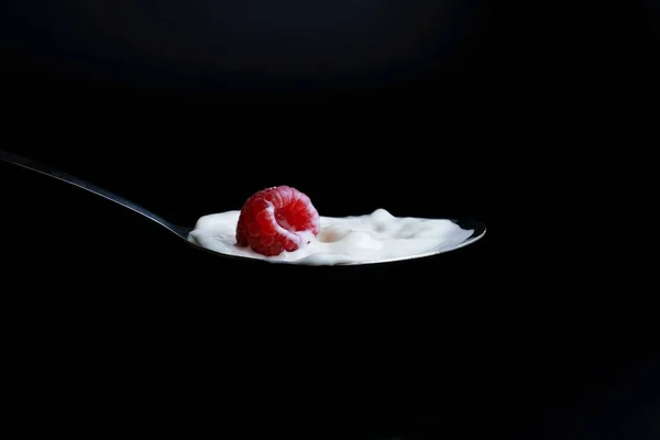 Raspberry Splashing Milk Metal Spoon Splash Effect Black Background — Stock Photo, Image