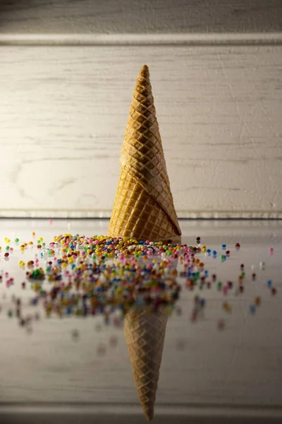Vertical Shot Waffle Cone Scattered Candies — Stock Photo, Image