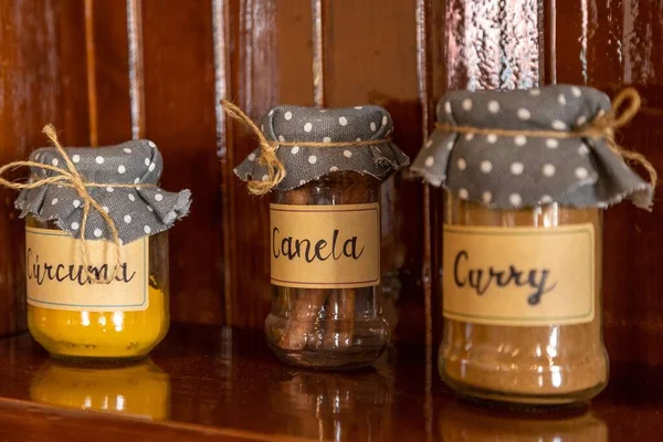 Closeup Shot Jars Spices Dotted Cloths Lids Names Spices Written — Stock Photo, Image