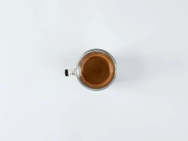 Beyaz Bir Masada Bir Fincan Sıcak Çayın Üst Görüntüsü — Stok fotoğraf