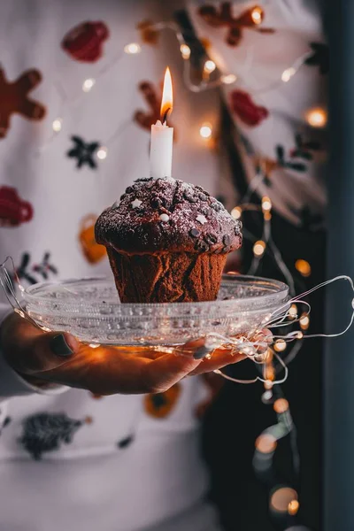Vertical Shot Female Hand Holding Delicious Chocolate Muffin Lit Candle — Stock Photo, Image
