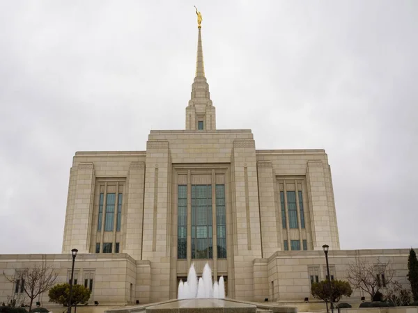 stock image The Ogden Utah Temple or The Church of Jesus Christ of Latter Day Saints with a gray cloudscape in the background