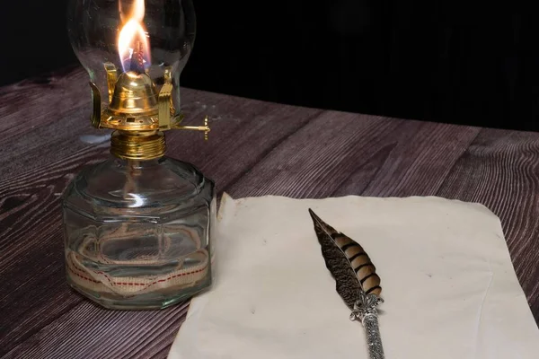Closeup Burning Old Antique Hurricane Oil Lamp Quill Pen Paper — Stock Photo, Image