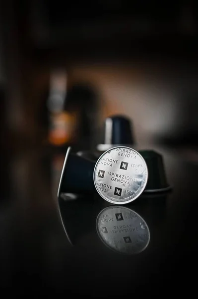 Vertical Shot Nespresso Capsules Dark Blurred Background — Stock Photo, Image