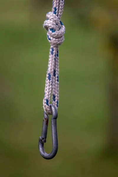 Closeup Shot Rope Metal Hook Blurred Background — Stock Photo, Image