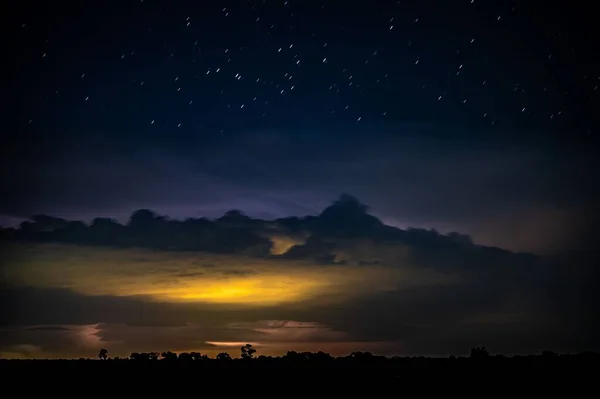 Beautiful Shot Starry Night Sunset Clouds Field — Stock Photo, Image