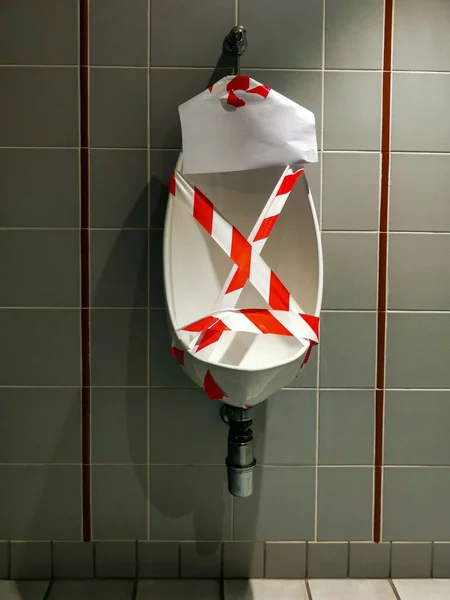 Vertical Shot Urinal Men Barricade Tape — Stock Photo, Image