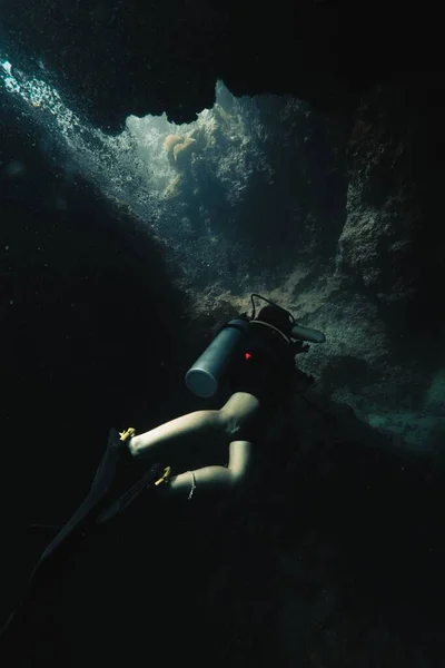 A human during scuba diving in ocean