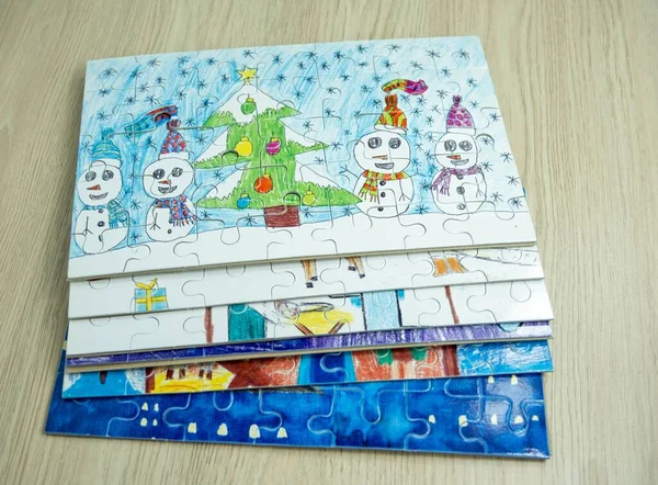 Top View Puzzles Various Winter Themed Paintings Children — Stock Photo, Image