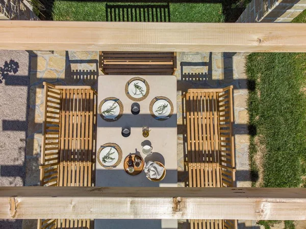 Aerial Shot Wooden Pergola Dinning Chairs Table Plates Cups — Stock Photo, Image
