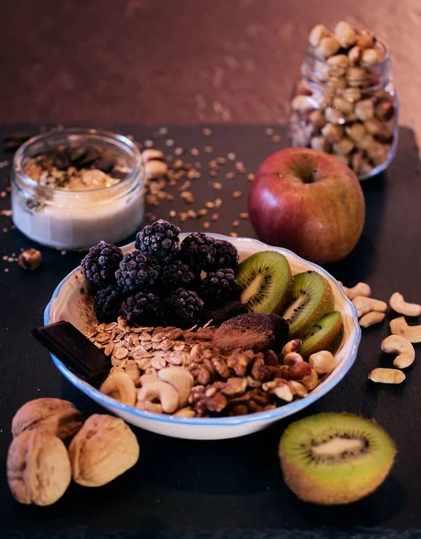 Vertical Shot Healthy Bowl Fruits Oats Messy Table Ingredients — Stock Photo, Image
