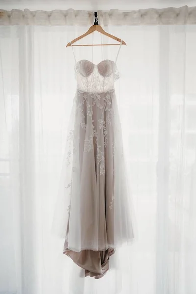 White Bridal Dress Hanging Wall Window — Stock Photo, Image
