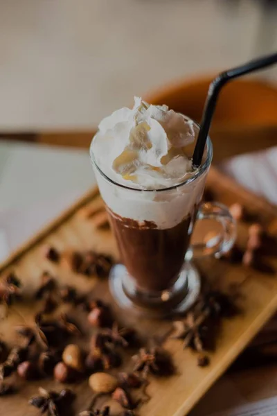 Close Hot Chocolate Tall Glass Whipped Cream Wooden Board Cafe — Stock Photo, Image