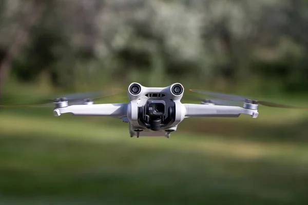 Closeup Dji Mini Pro Aerial Drone Blurred Trees Background — Stock Photo, Image