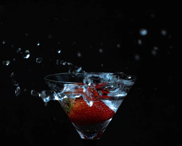 Closeup Cocktail Strawberry Glass Water Splash Black Background — Stock Photo, Image