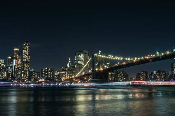 A beautiful shot of the illuminated skyline of New York at night in the United States