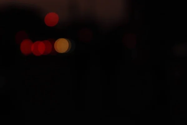 Karanlıktaki Bulanık Bokeh Işıkları — Stok fotoğraf
