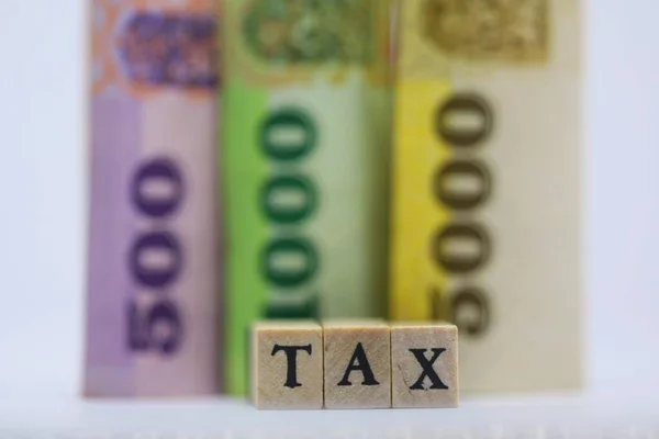 Een Tax Concept Met Een Houten Blok Met Achtergrond Van — Stockfoto