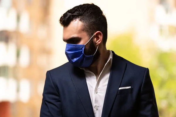 Young Muslim Man Praying Outdoors While Wearing Protective Mask — Stock Photo, Image