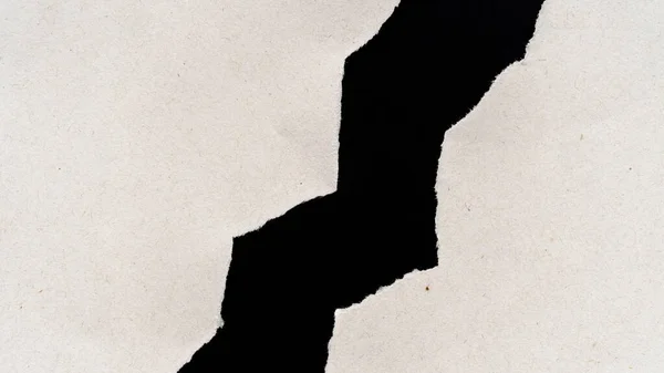 Макроснимок Разорванной Бумаги Грубыми Краями Черном Фоне Концепция Географической Карты — стоковое фото