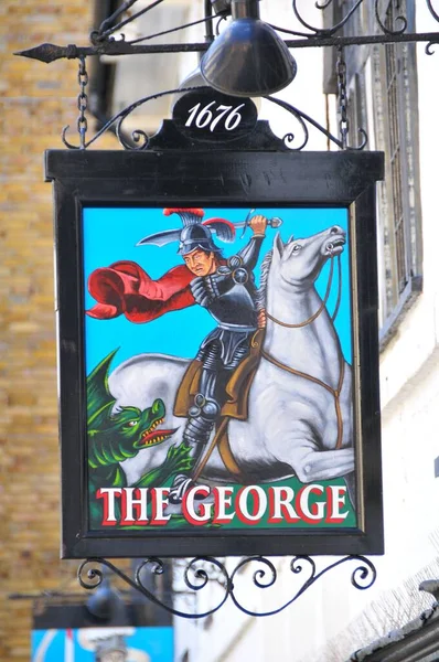 stock image A vertical shot of Saint George's picture sign on an old pub in London, United Kingdom