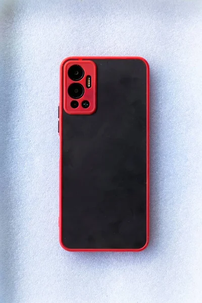 Vertical Top View Red Black Phone Case White Wall Background — Stock Photo, Image