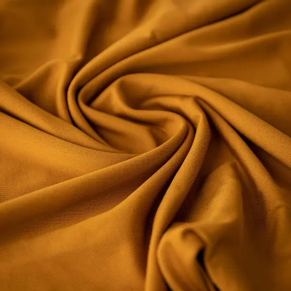 Dalgalı Desenli Parlak Kahverengi Bir Kumaş — Stok fotoğraf