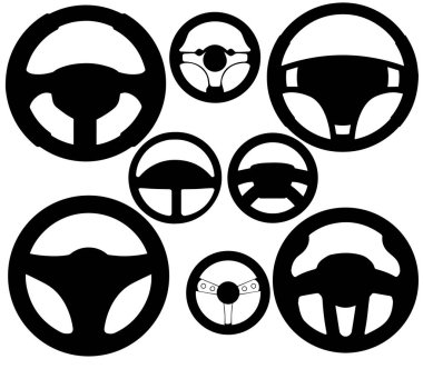 Farklı boyutlarda çeşitli siyah direksiyonlar.