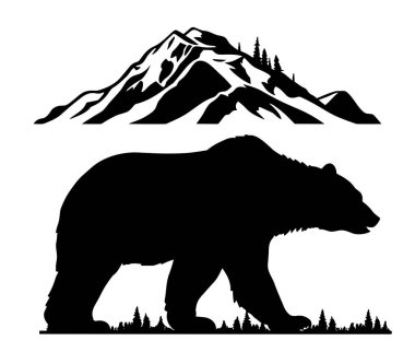 Dağların önünde ağaçlarla yürüyen ayı silueti..