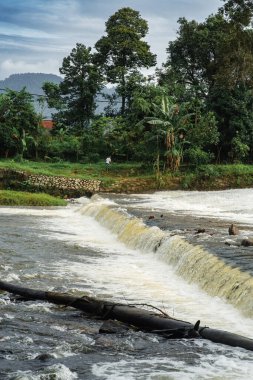 Close up of the water flowing at the river.