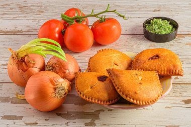 Preparing delicious savory pastries with vegetables