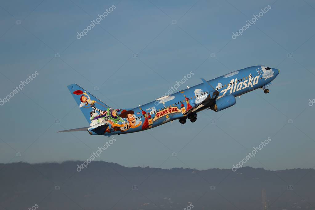 Alaska Airlines Airplane with Pixar Pier Livery Taking Off