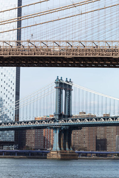 Manhattan Bridge and part of the Brooklyn Bridge on a sunny day