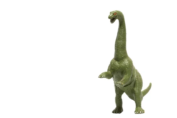 Ένα Μακρύ Λαιμό Πλαστικό Δεινόσαυρος Στέκεται Στα Δύο Πόδια Απομονώνονται — Φωτογραφία Αρχείου