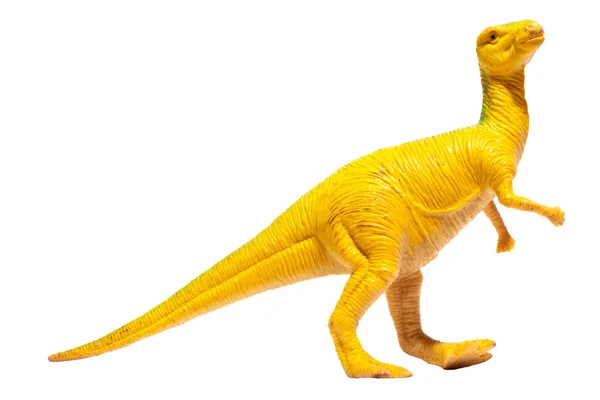 白い背景に孤立したプロフィールの黄色のプラスチック恐竜 ドリヨサウルス — ストック写真