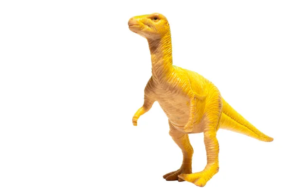 白い背景に孤立した黄色のプラスチック製のドリソサウルス — ストック写真