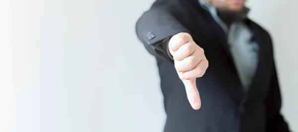 Executive Suit Giving His Thumbs Disapproval Front Out Focus Grayish Stock Photo