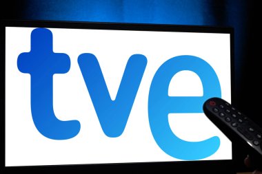 Bogota, Colombia - January 14, 2025: Remote control pointing to TVE, the leading news and culture TV channel in Spain clipart