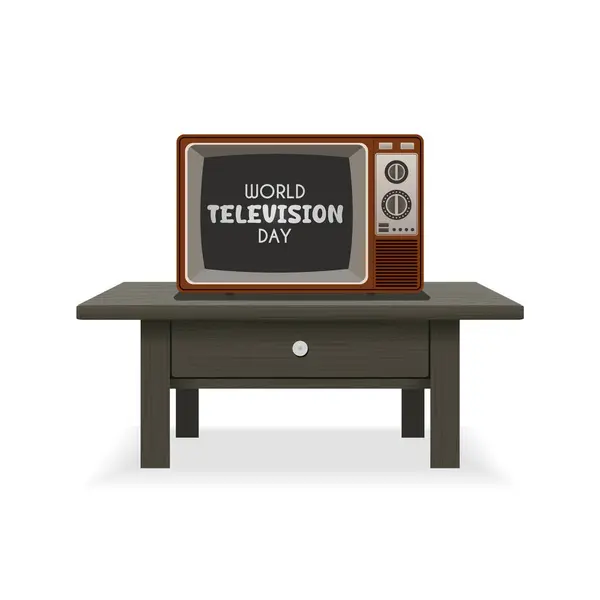 Masadaki eski kahverengi televizyon seti ve televizyon ekranındaki Dünya Televizyon Günü tabiri.