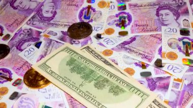 Banknotes English pound, dollar, euro, close-up, on a dark and white background