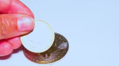 British pound coins put on a table on a white background