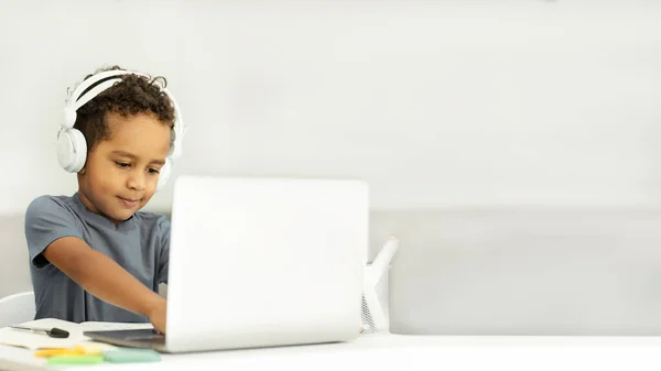 Portrait Little Boy Wireless Headset Using Laptop Doing Online Home — Stock Photo, Image