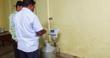 Mysore,India-June 20,2016:Worker noting down the readings of weigh scale at factory during inspection