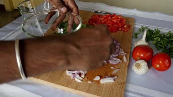 Closeup Chopped Onion Being Put Glass Bowl Male Hands Kitchen — Vídeo de Stock