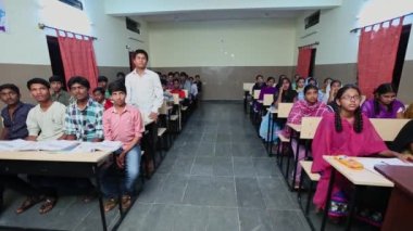 Kaiwara,Chikkaballapura,India-January 5,2017:Wide view girls and boys question and answering time in the classroom after listening the lecture