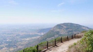 Panoramic view of farmlands and nature from the top of mountain during summer season