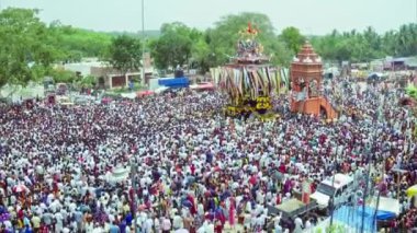 An aerial view of the chariot procession and celebration of a Hindu religious festival at Yediyur, Karnataka